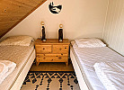 2 Schlafzimmer mit jeweils 2 Einzel-Betten im OG 